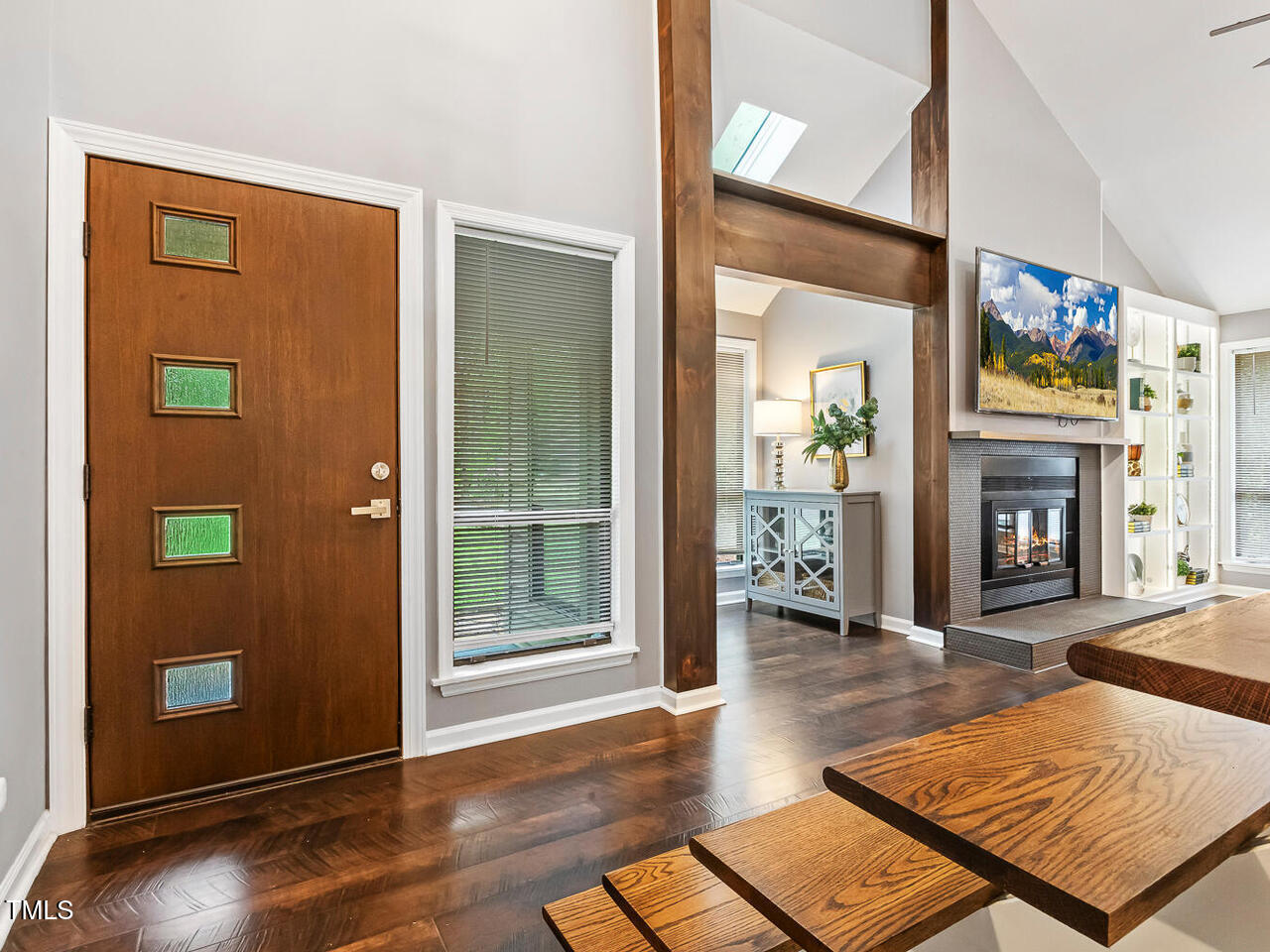 3900 Maplefield Drive Raleigh, NC 27613 - Photo 10 of 58 a living room with furniture and a fireplace
