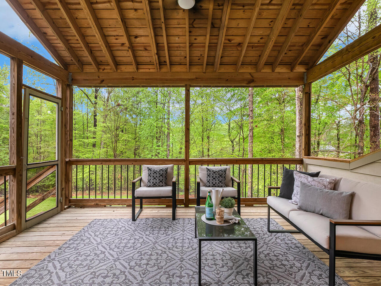 3900 Maplefield Drive Raleigh, NC 27613 - Photo 28 of 58 a living room with furniture and a large window