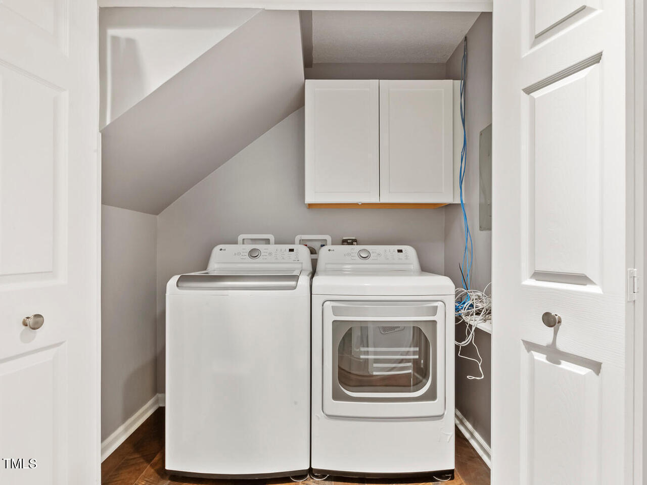 3900 Maplefield Drive Raleigh, NC 27613 - Photo 36 of 58 a utility room with dryer and washer