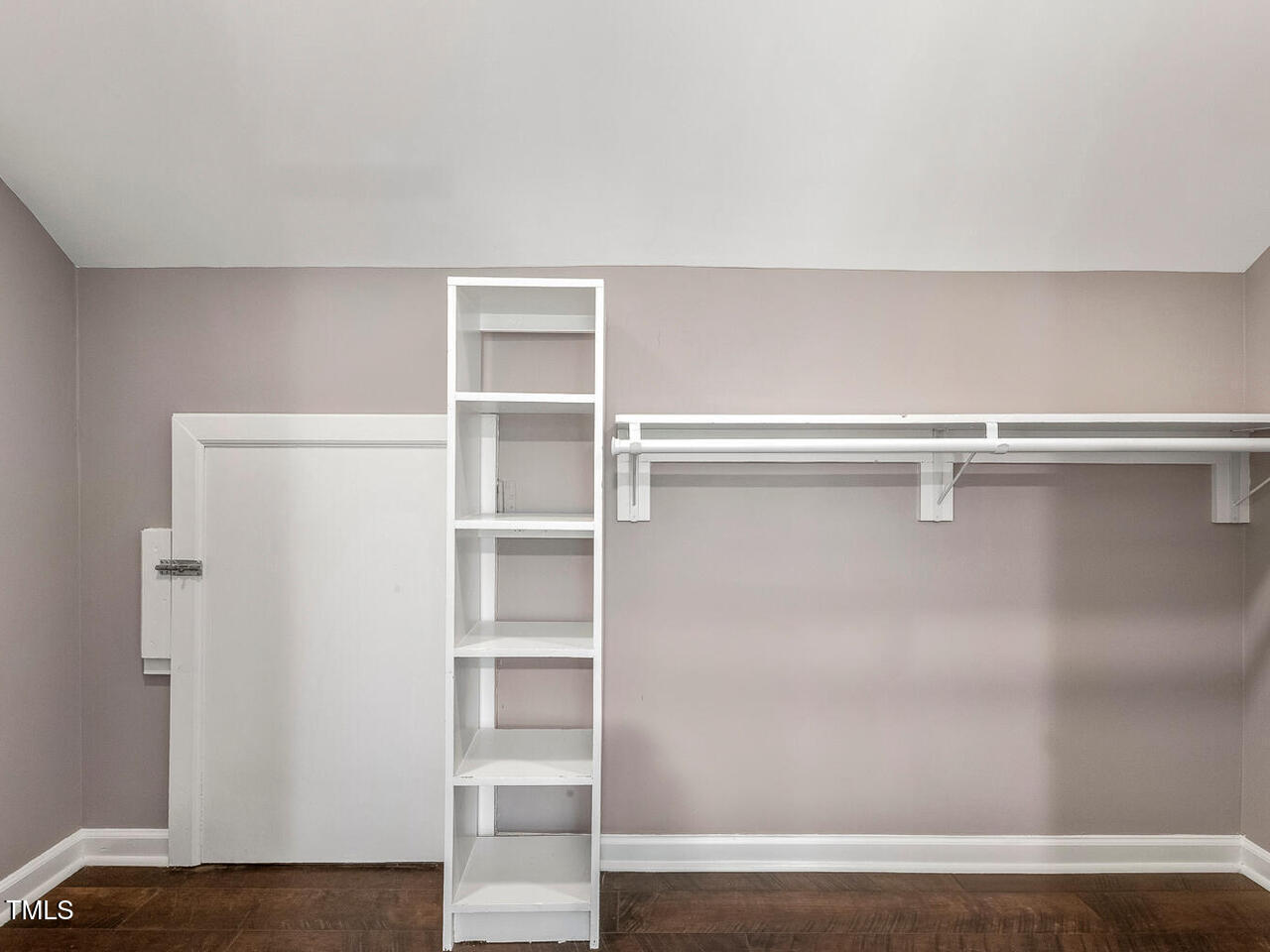 3900 Maplefield Drive Raleigh, NC 27613 - Photo 42 of 58 a view of walk in closet with empty racks