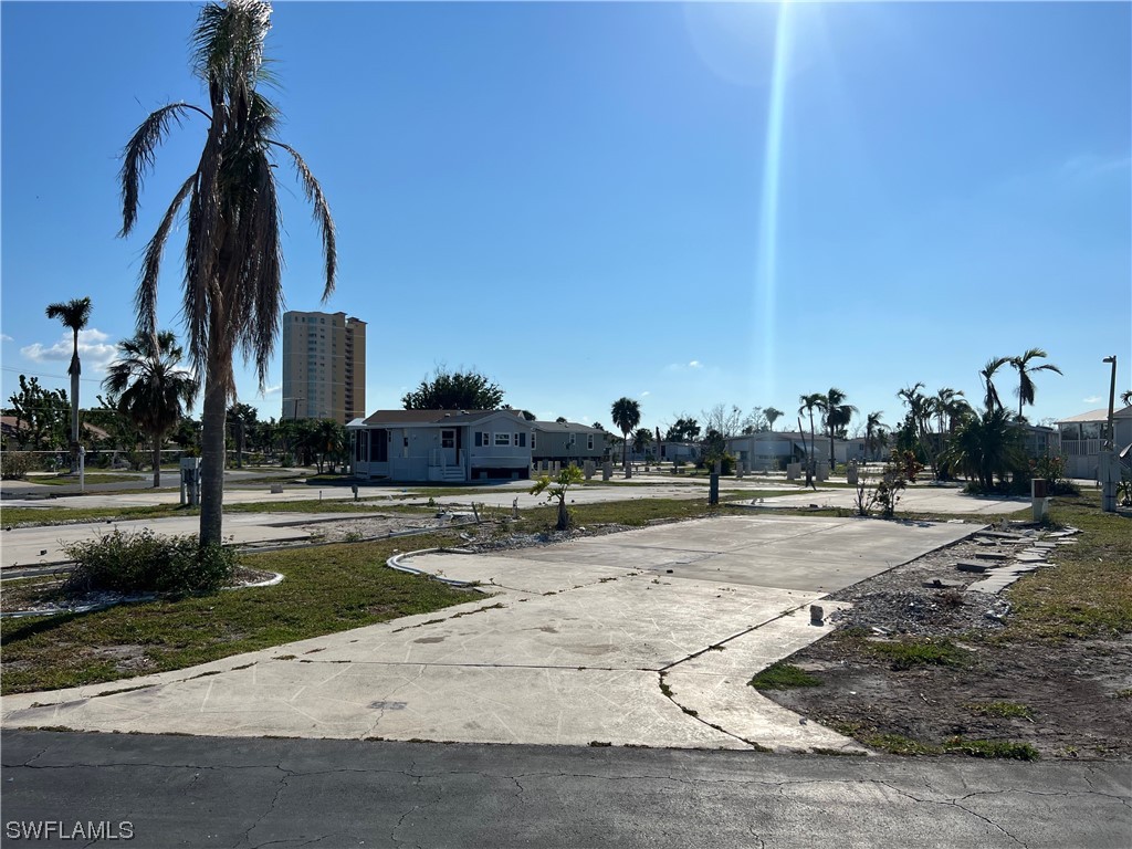 a view of a town with tall building