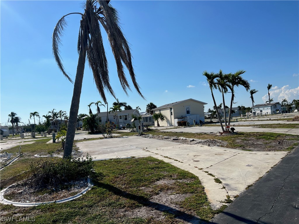 19681 Summerlin Road, Unit F 95 Fort Myers, FL 33908 - Photo 2 of 7 a view of a park with swings