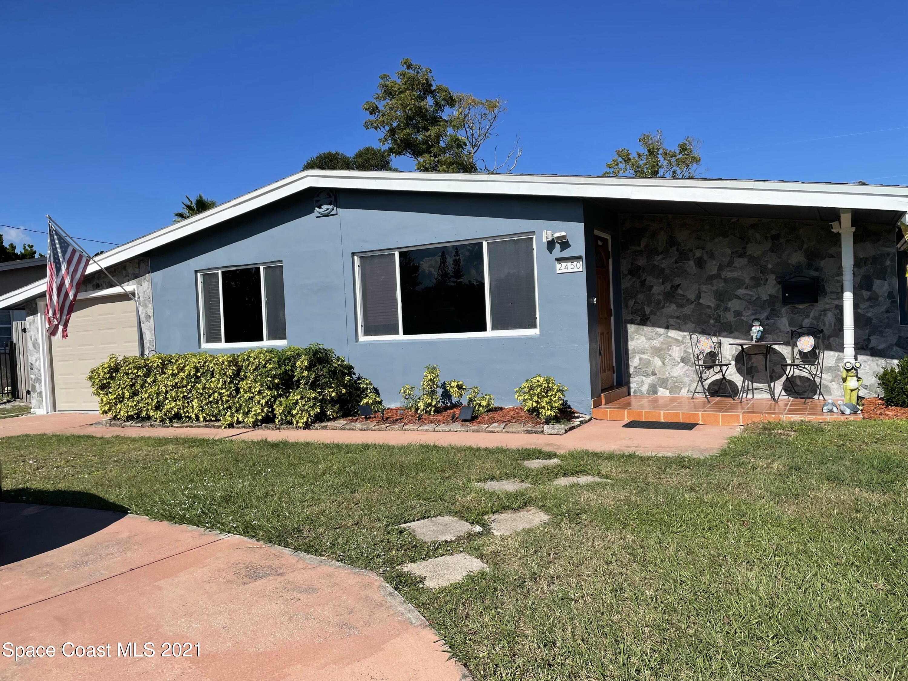 2450 Allan Adale Road Melbourne, FL 32935 - Photo 1 of 29 front