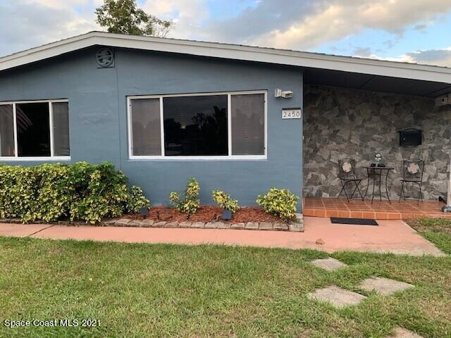 2450 Allan Adale Road Melbourne, FL 32935 - Photo 2 of 29 front