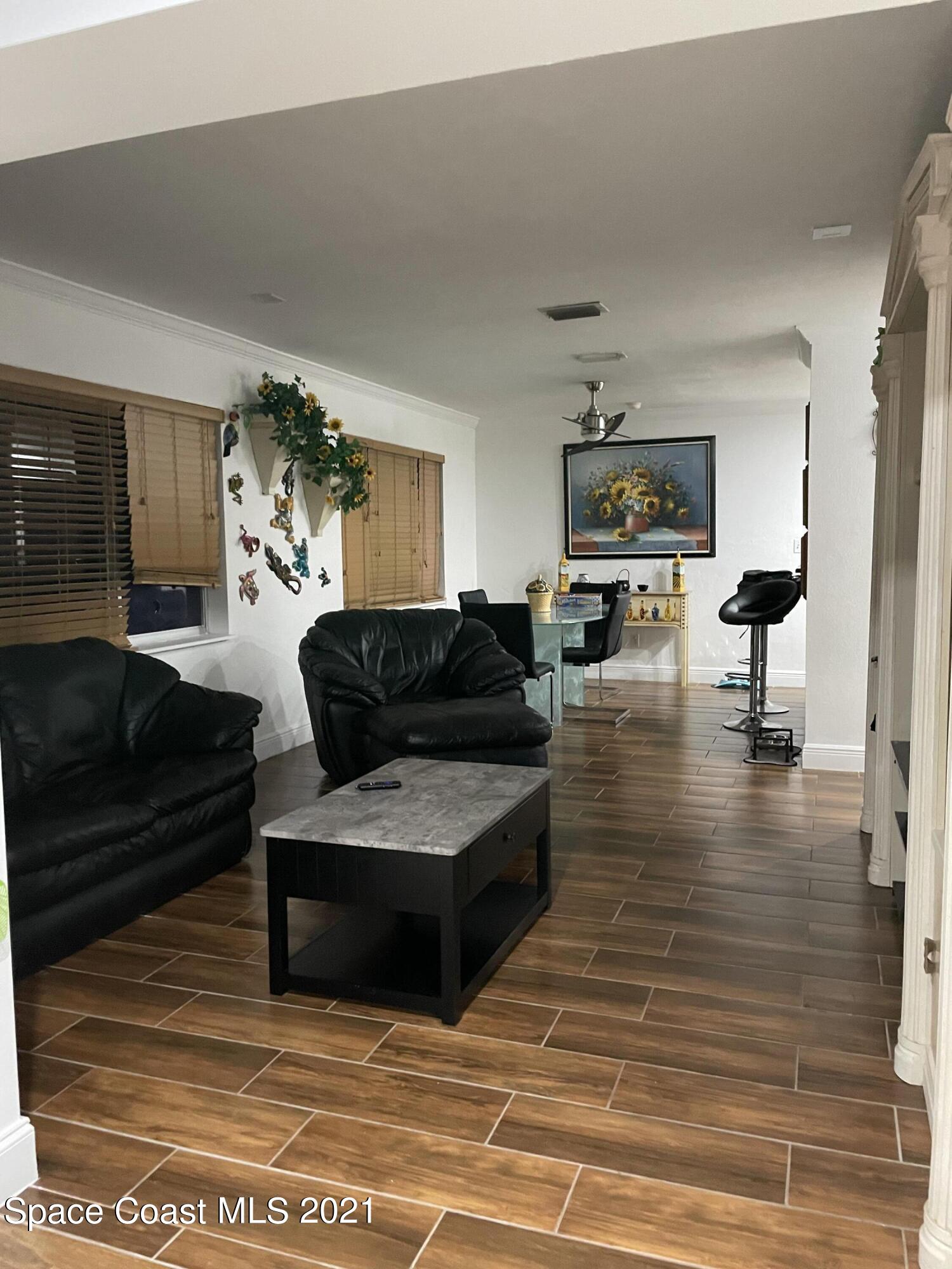 2450 Allan Adale Road Melbourne, FL 32935 - Photo 11 of 29 living to dining