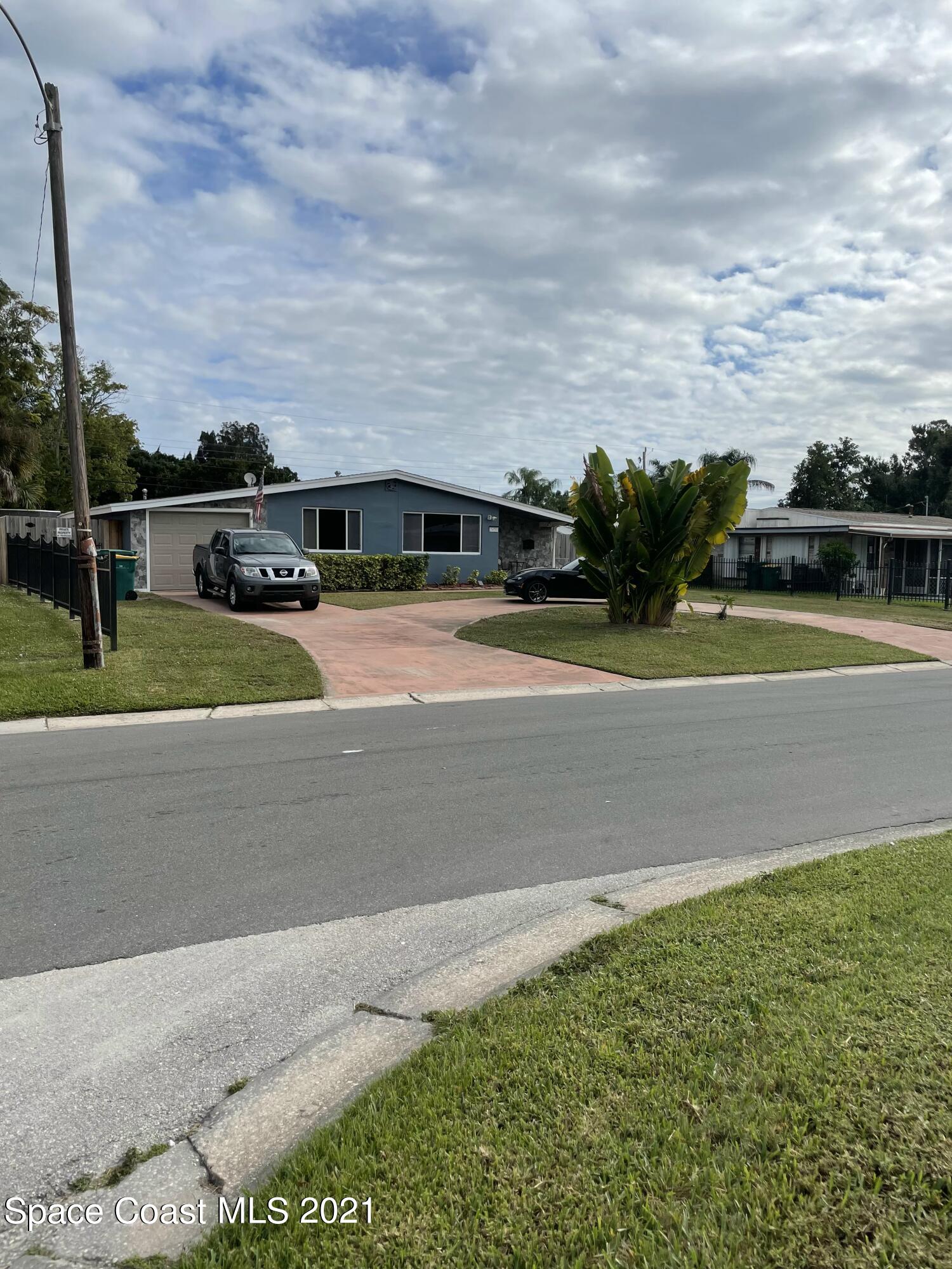 2450 Allan Adale Road Melbourne, FL 32935 - Photo 29 of 29 driveway