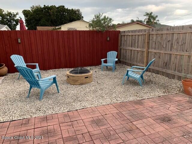 2450 Allan Adale Road Melbourne, FL 32935 - Photo 6 of 29 yard. fire pit