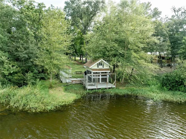 a view of a house with a lake view