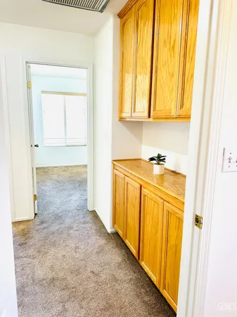 a view of a bathroom with a sink and a window
