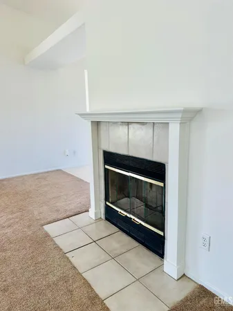 a living room with a fireplace