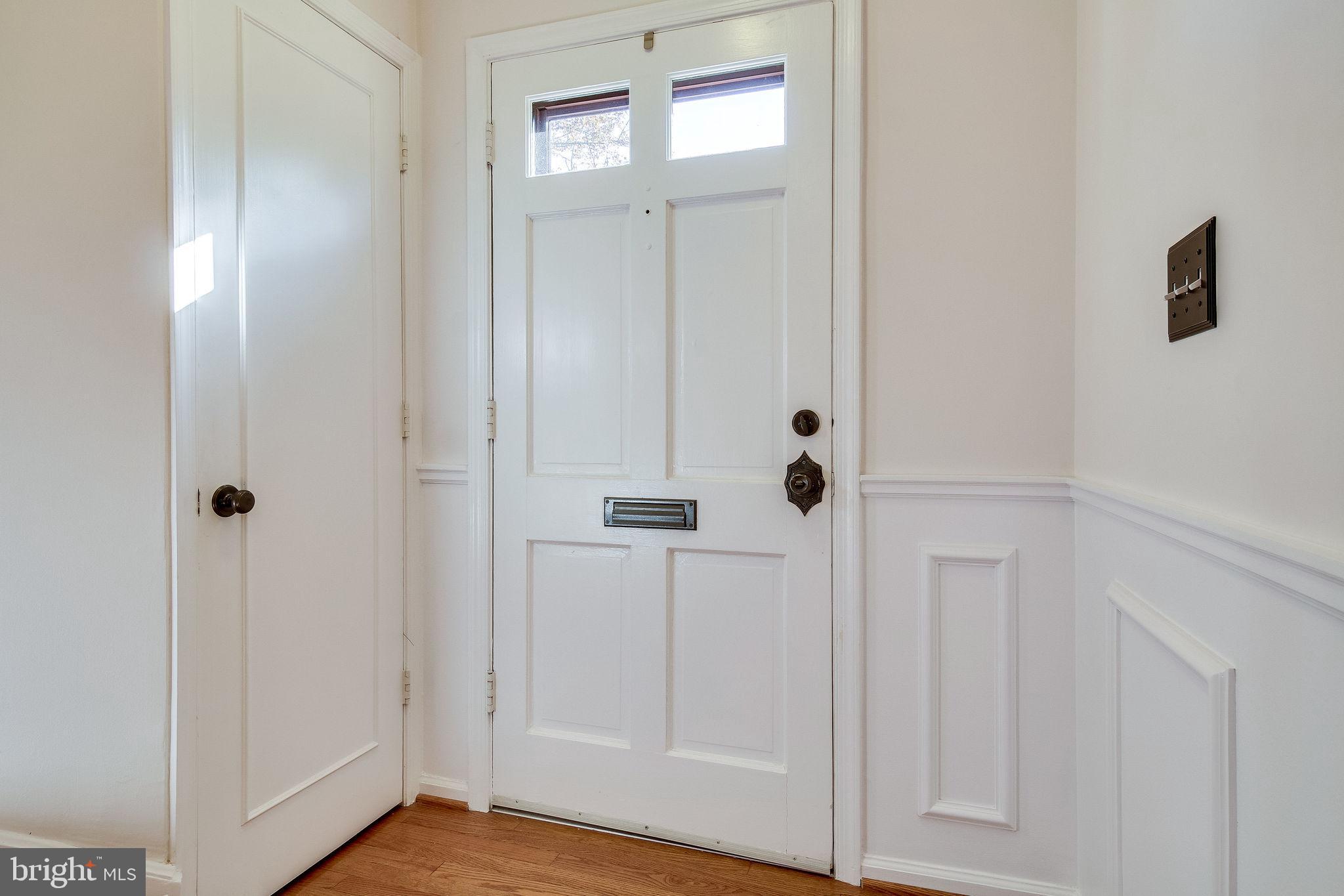 8344 Wickham Road Springfield, VA 22152 - Photo 3 of 72 Front foyer with wainscoting and chair rail