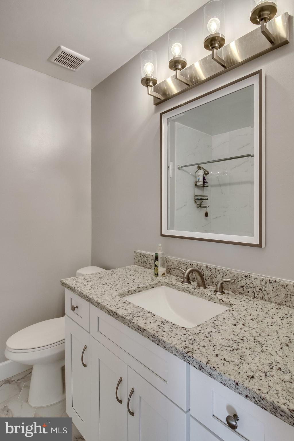 8344 Wickham Road Springfield, VA 22152 - Photo 37 of 72 Renovated hallway bath