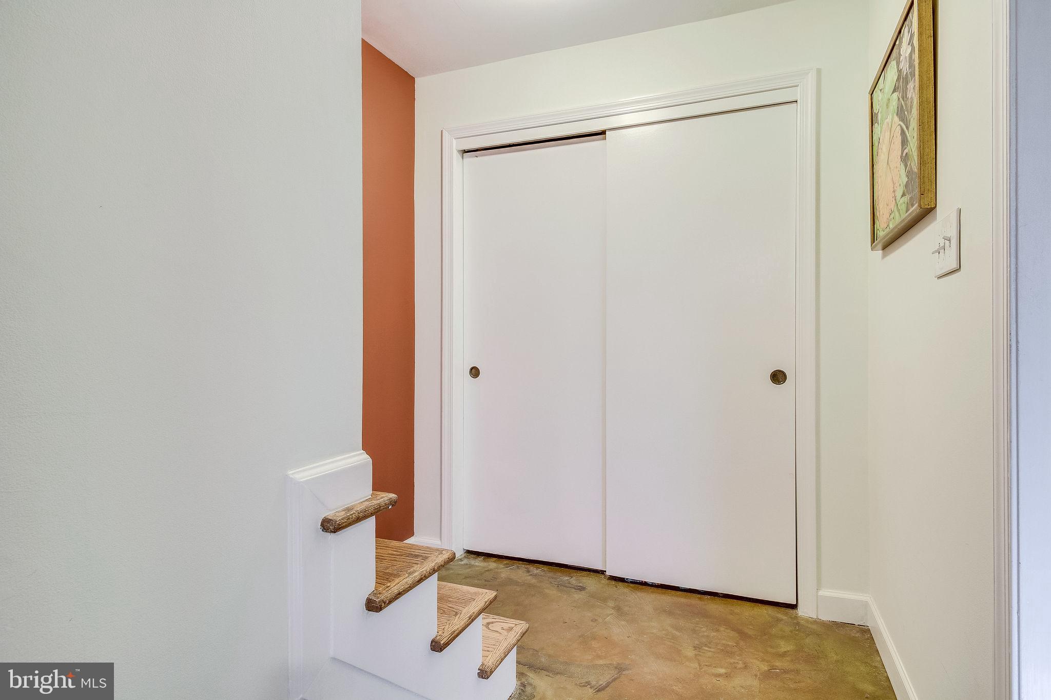 8344 Wickham Road Springfield, VA 22152 - Photo 47 of 72 Storage at foot of basement steps