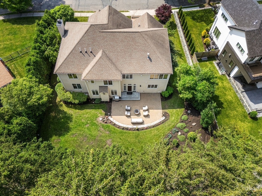 22 Scotney Road Newton, MA 02467 - Photo 41 of 42 an aerial view of a house with swimming pool garden and patio