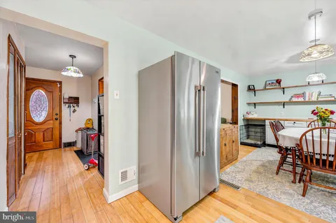 a view of a kitchen from the dinning room