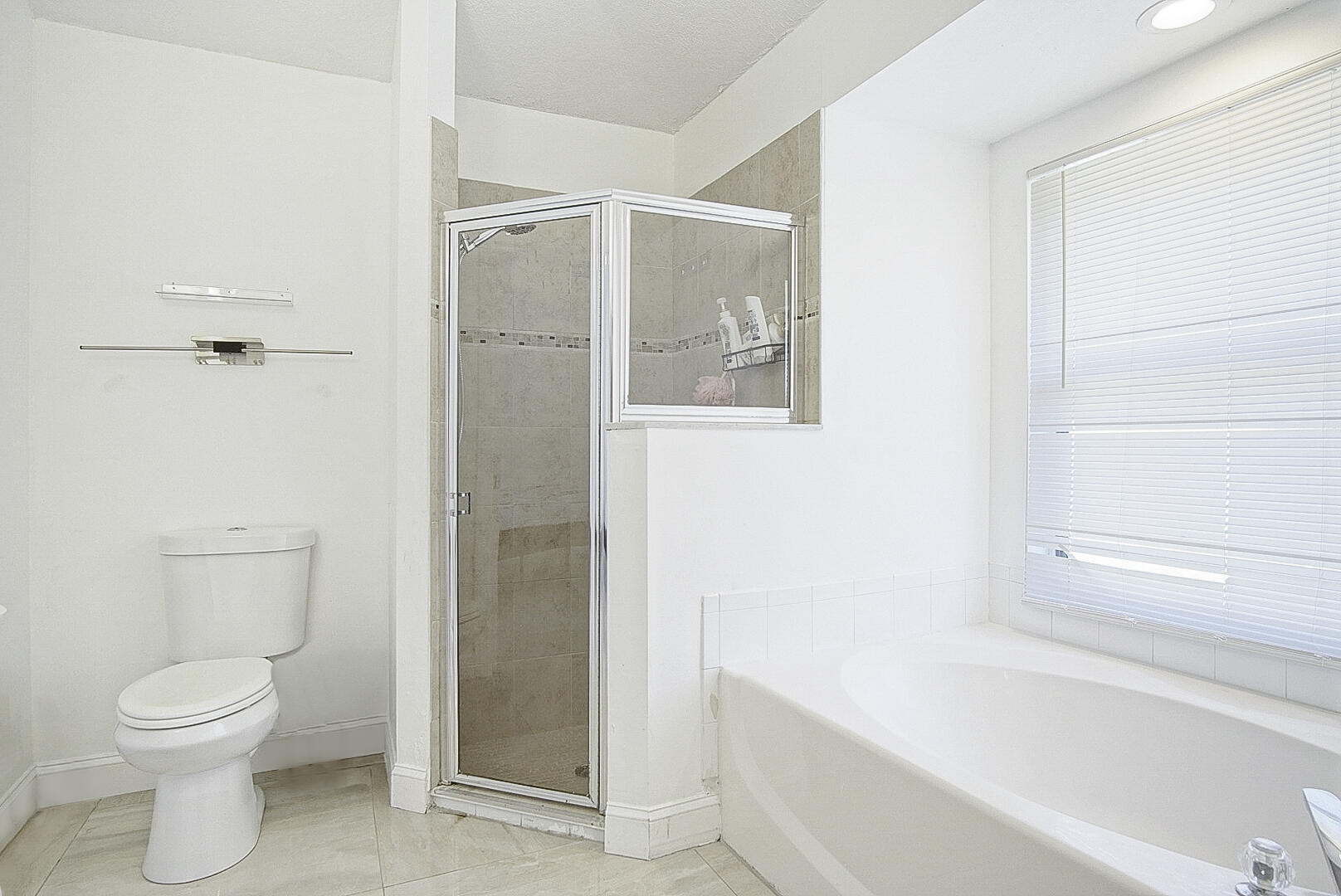 2619 Southwest Fair Isle Road Port St. Lucie, FL 34987 - Photo 16 of 33 a bathroom with a toilet and a shower