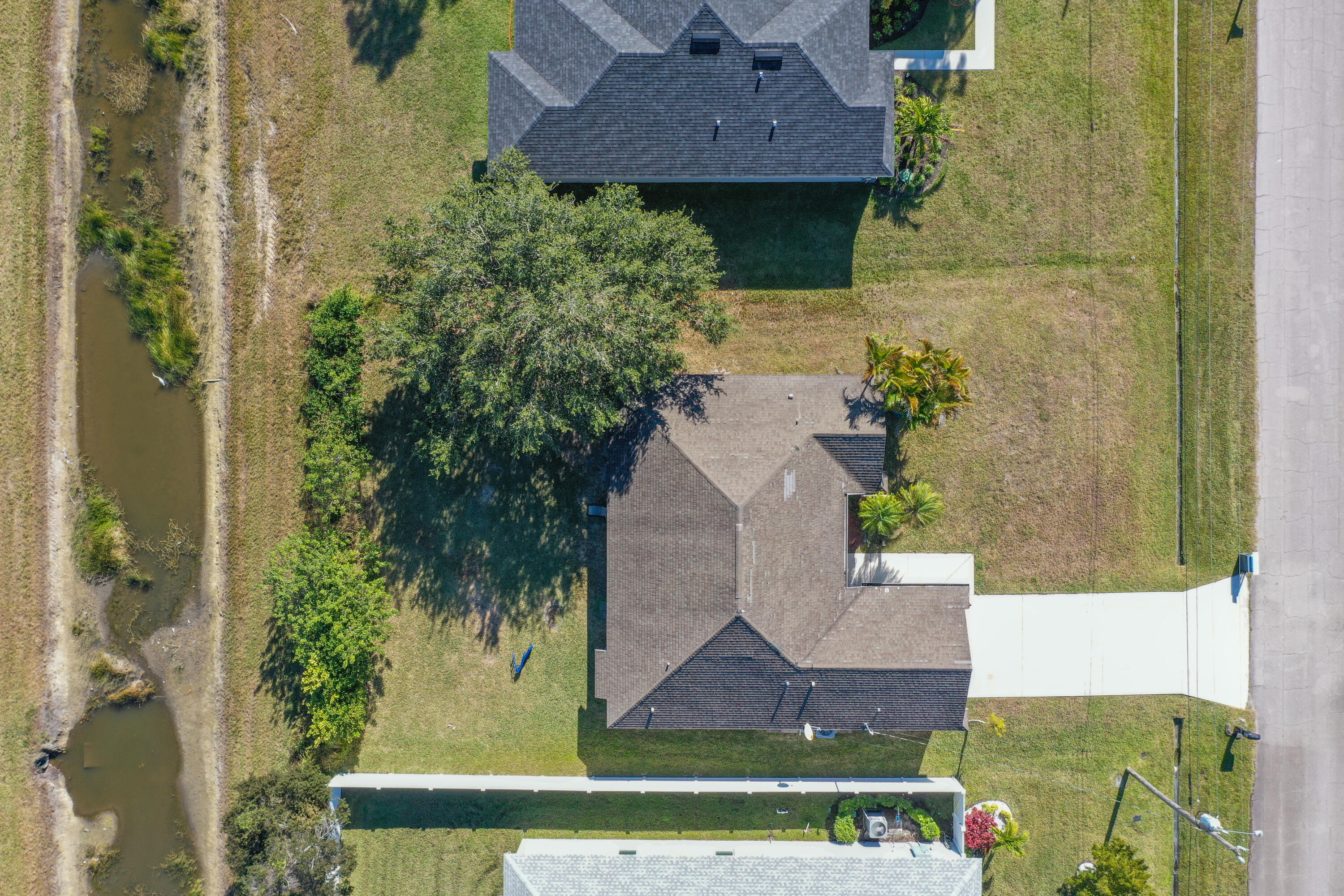 2619 Southwest Fair Isle Road Port St. Lucie, FL 34987 - Photo 27 of 33 an aerial view of a house