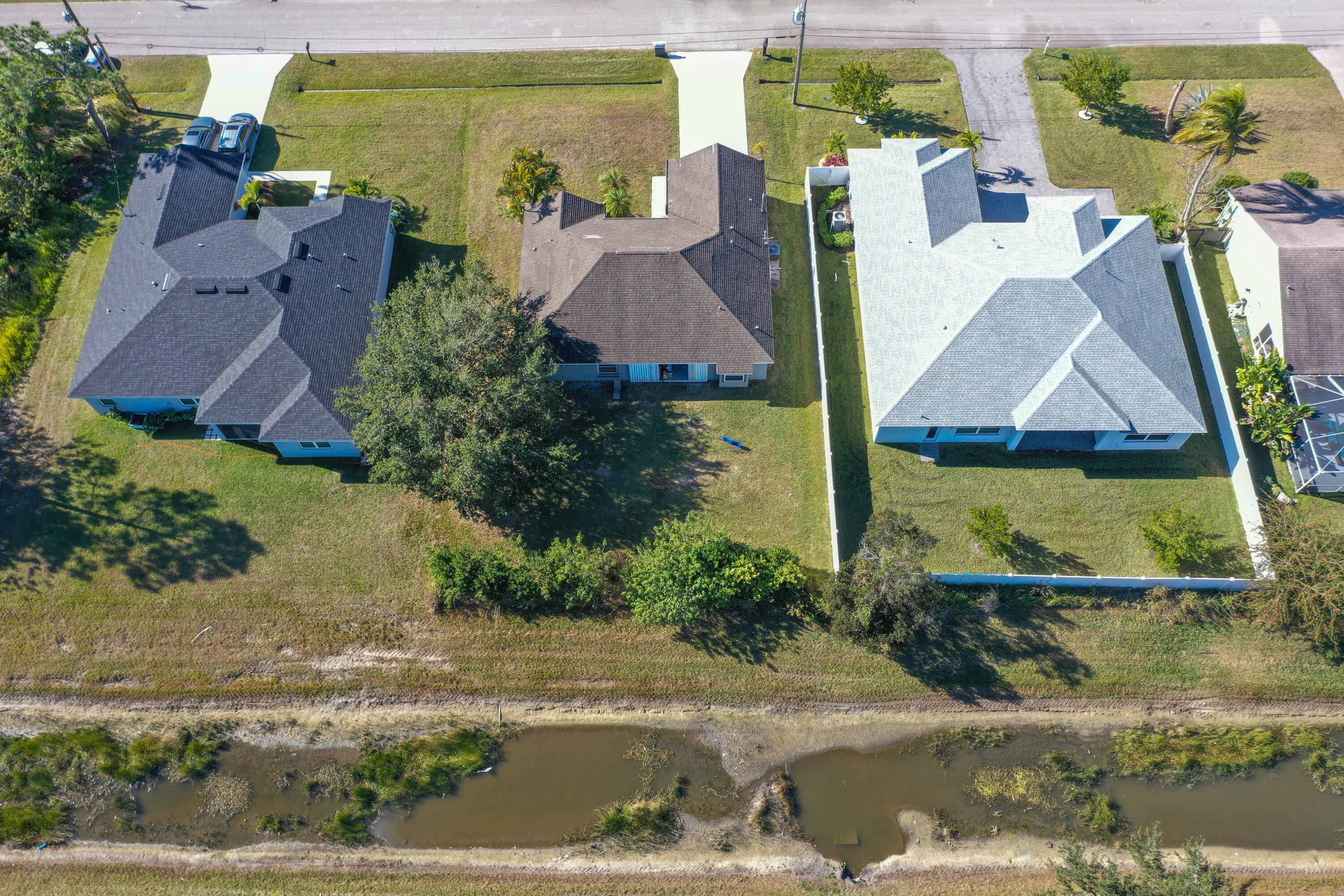 2619 Southwest Fair Isle Road Port St. Lucie, FL 34987 - Photo 28 of 33 an aerial view of houses with yard