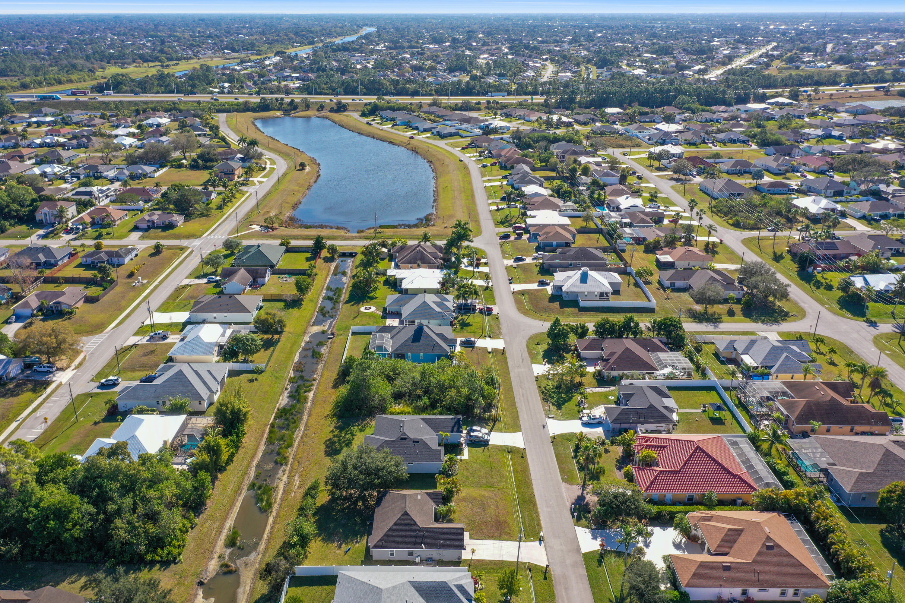 2619 Southwest Fair Isle Road Port St. Lucie, FL 34987 - Photo 29 of 33 an aerial view of residential houses with outdoor space