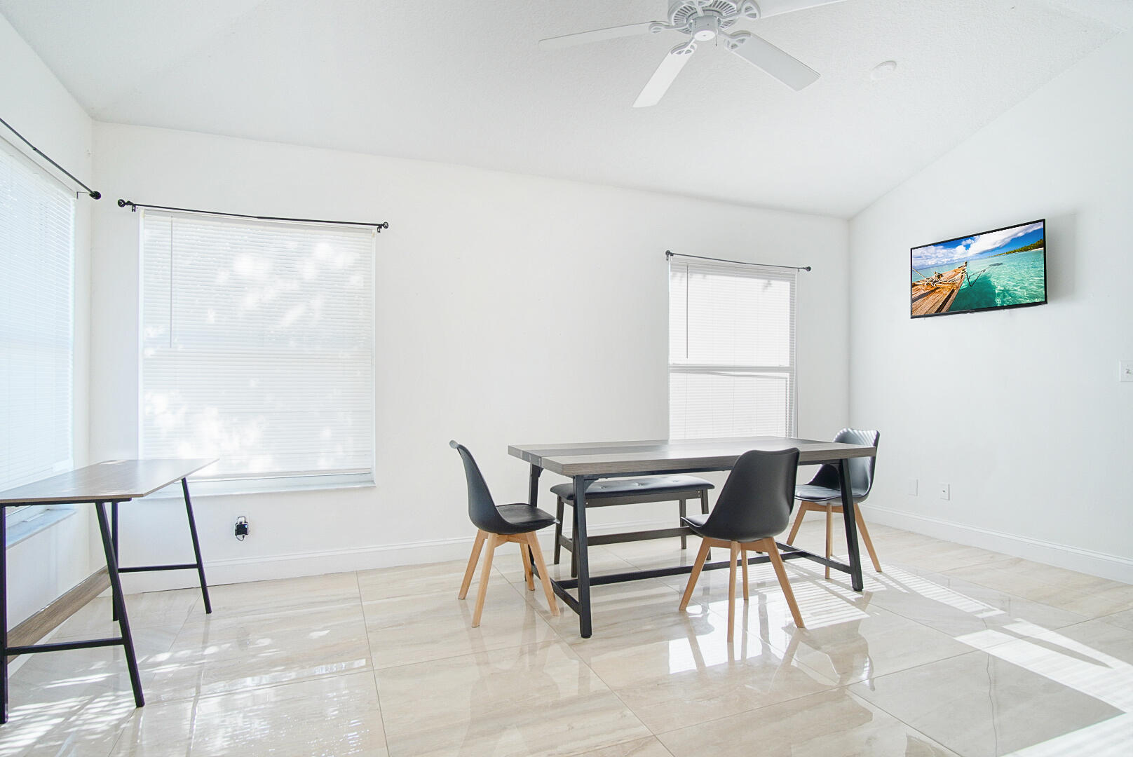 2619 Southwest Fair Isle Road Port St. Lucie, FL 34987 - Photo 8 of 33 a view of a workspace with furniture and a window