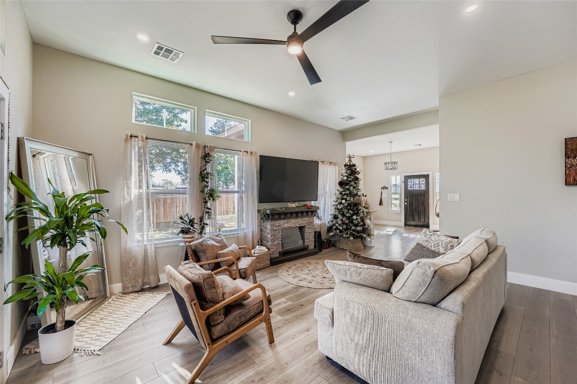 149 Arosa Drive Elgin, TX 78621 - Photo 13 of 40 a living room with furniture and a flat screen tv