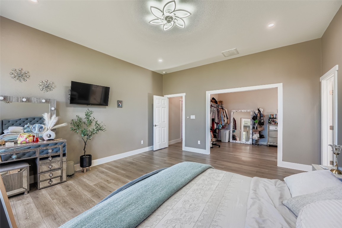 149 Arosa Drive Elgin, TX 78621 - Photo 16 of 40 a view of a livingroom with furniture and a flat screen tv