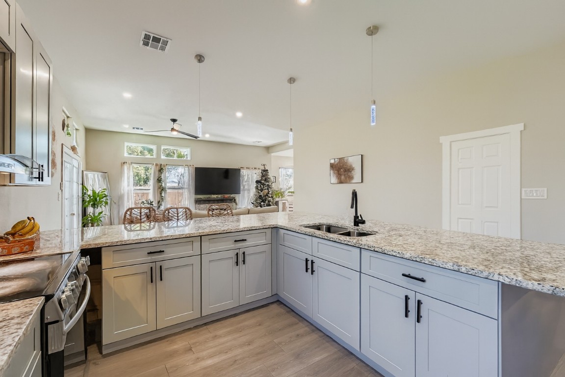 149 Arosa Drive Elgin, TX 78621 - Photo 40 of 40 a kitchen with a sink and cabinets