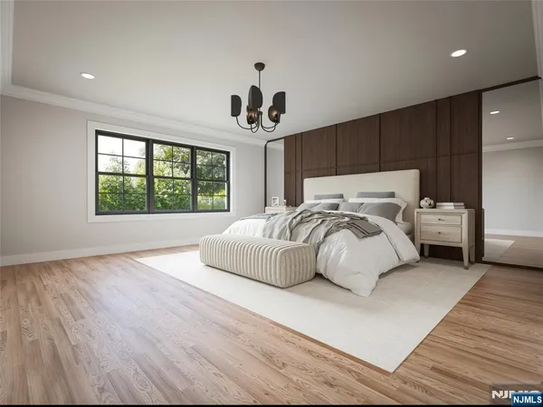 a bedroom with bed and window