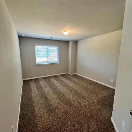 an empty room with a window