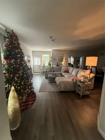 a living room with furniture window and a lamp