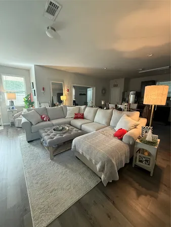 a bed room with two bed and a couch
