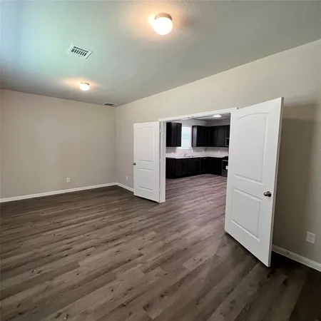 a view of entryway with wooden floor