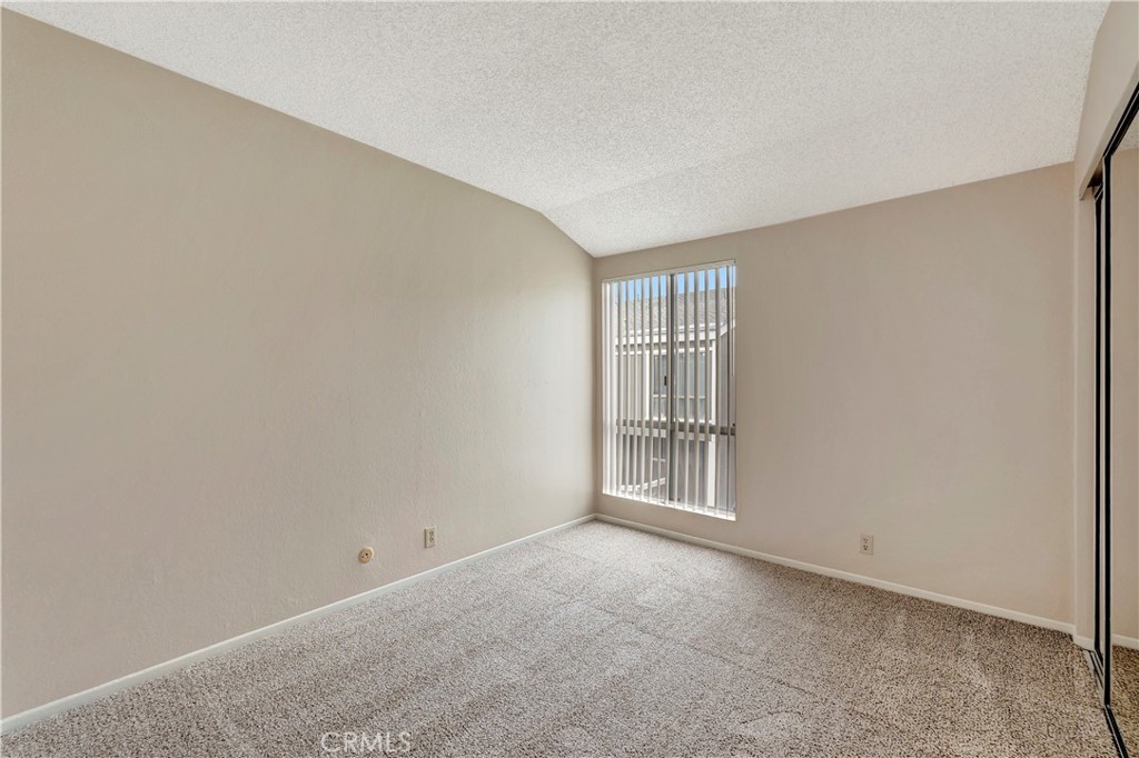 2670 West Segerstrom Avenue, Unit F Santa Ana, CA 92704 - Photo 22 of 28 a view of an empty room with a window
