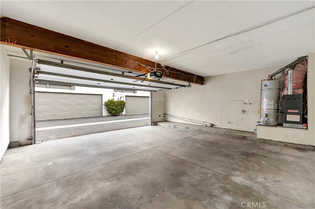 2670 West Segerstrom Avenue, Unit F Santa Ana, CA 92704 - Photo 27 of 28 a view of a garage