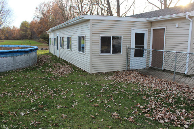 39199 Parsons Road Grafton, OH 44044 - Photo 2 of 25 Attached enclosed patio with a hot tub. 11.5 by 47