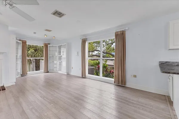 a bathroom with a toilet a sink and a mirror