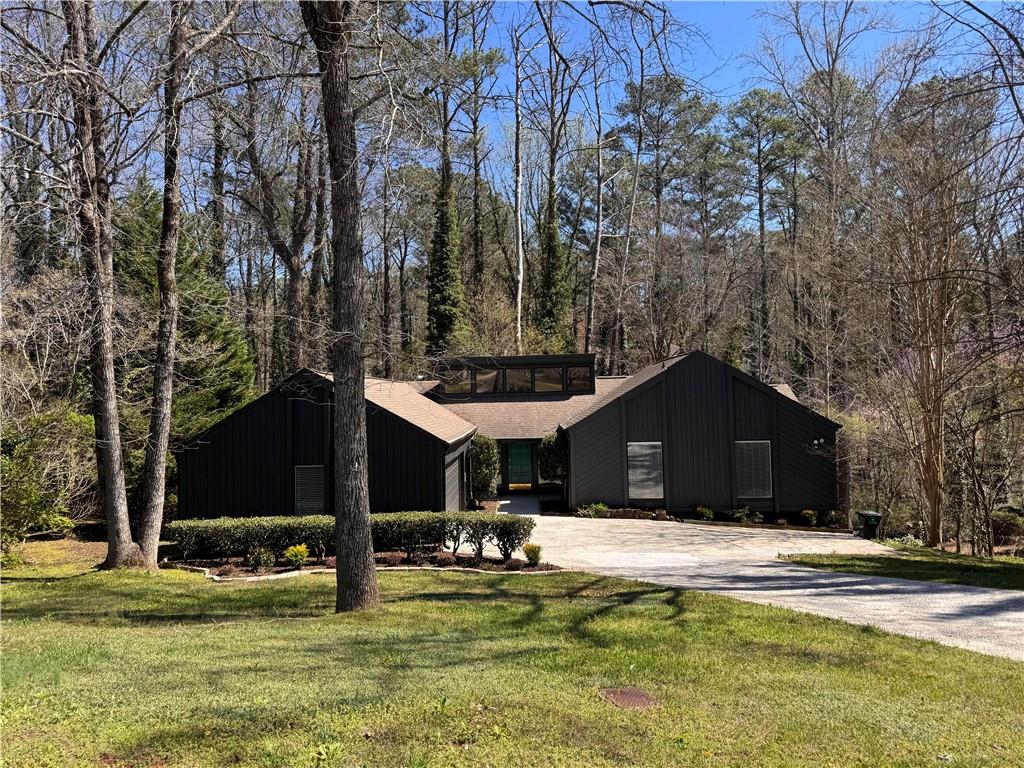 192 Kings Row Northeast Marietta, GA 30067 - Photo 1 of 34 a house view with swimming pool in front of it
