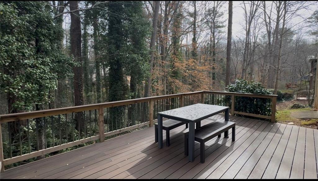 192 Kings Row Northeast Marietta, GA 30067 - Photo 30 of 34 a view of a balcony with furniture and wooden floor