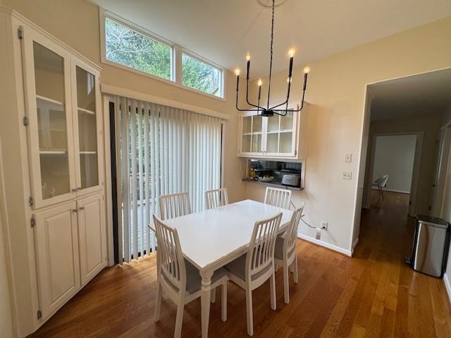 192 Kings Row Northeast Marietta, GA 30067 - Photo 8 of 34 a view of a dining room with furniture window and wooden floor