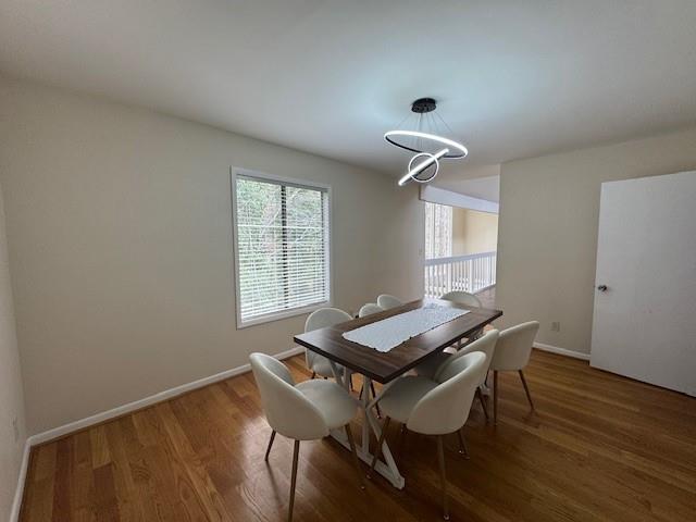 192 Kings Row Northeast Marietta, GA 30067 - Photo 9 of 34 a room with a table and chairs