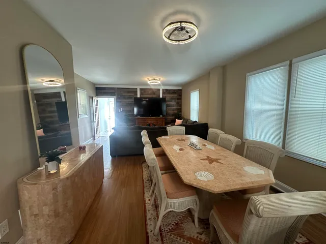 a view of a dining room with furniture