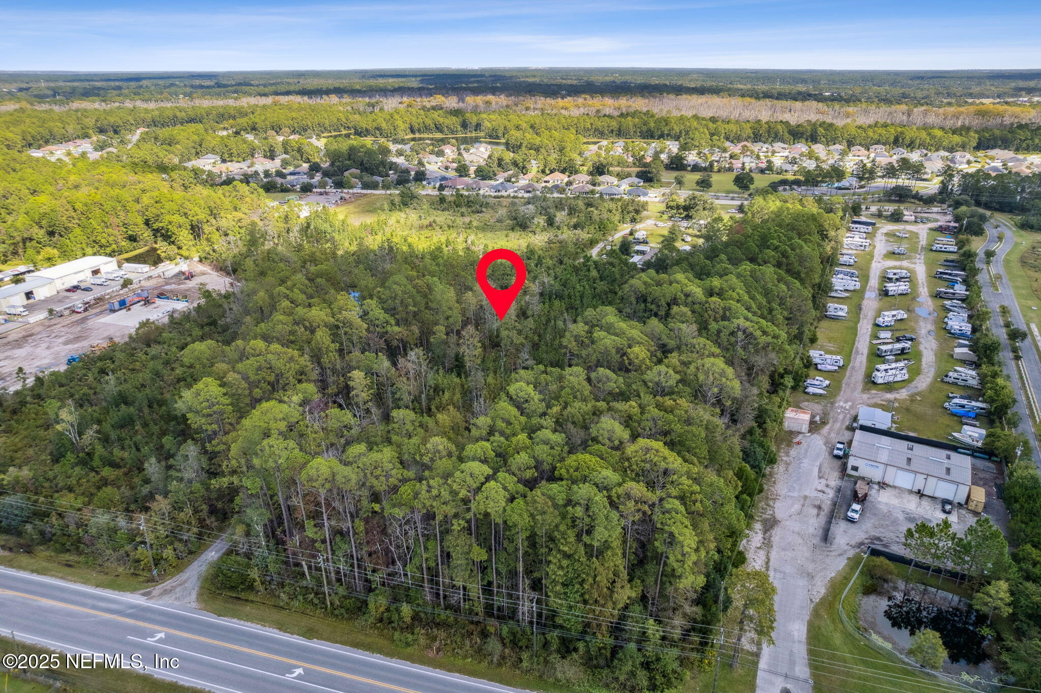 86158 Overstreet Lane Yulee, FL 32097 - Photo 16 of 25 a view of lake with city view