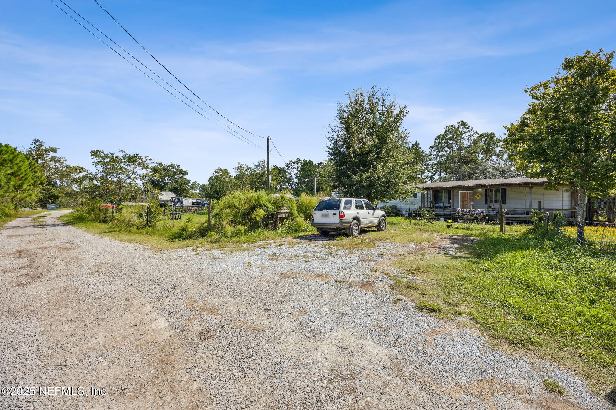 86158 Overstreet Lane Yulee, FL 32097 - Photo 24 of 25 a car parked in front of a house