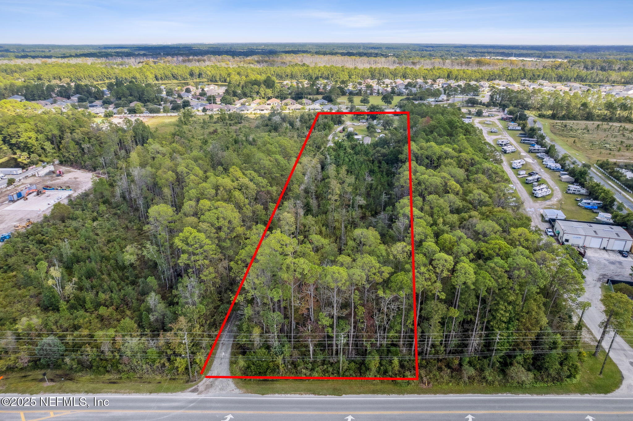 86158 Overstreet Lane Yulee, FL 32097 - Photo 4 of 25 a view of a city with lots of trees