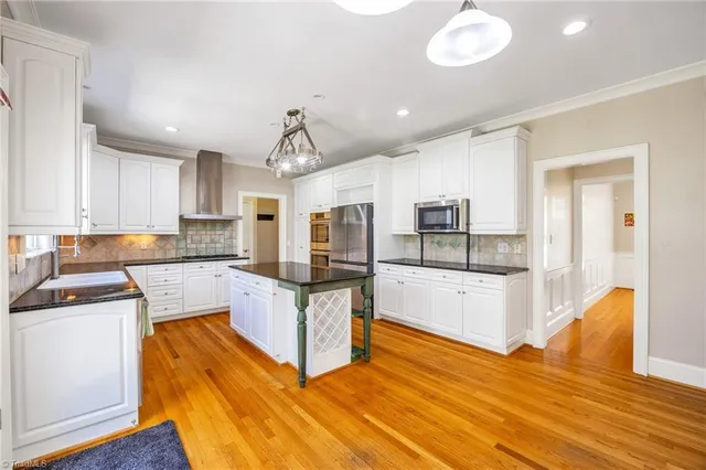 $663,000 | 6694 Fegan Road, Summerfield, NC 27358