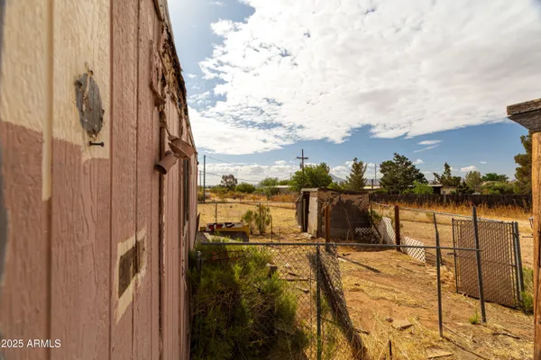 a view of a yard with an outdoor space