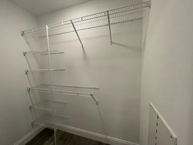 a view of a room with racks on the wall