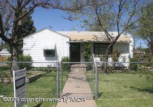 4318 South Ong Street Amarillo, TX 79110 - Photo 1 of 14 a view of a patio with table and chairs and potted plants