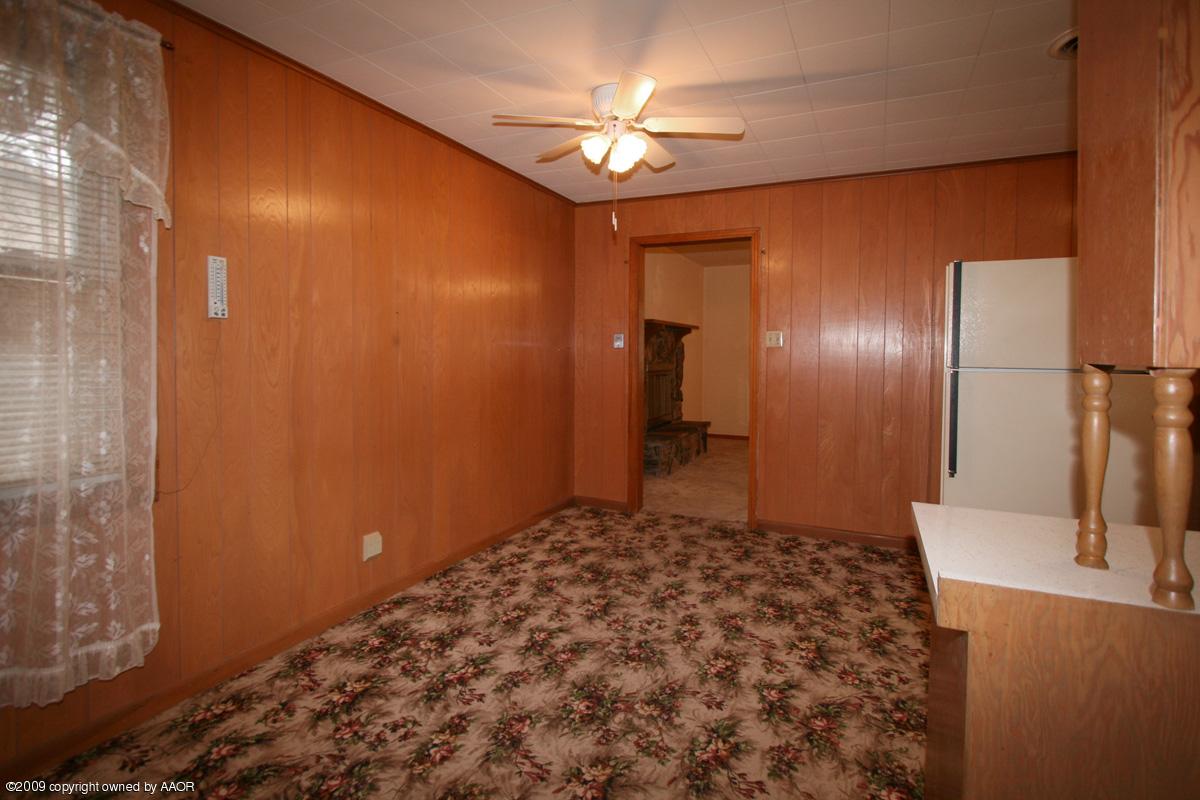 4318 South Ong Street Amarillo, TX 79110 - Photo 8 of 14 a bathroom with a sink and a shower