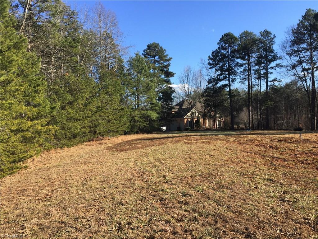 4070 Pond Road Burlington, NC 27215 - Photo 4 of 9 The open area of the property. you could build the home of your dreams here or on the other side of the trees for a raised view of the water.